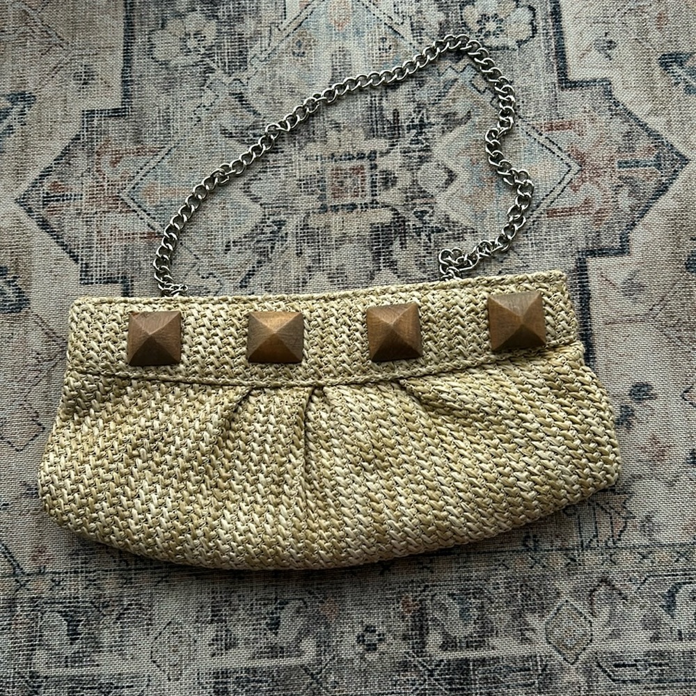 report signature straw woven clutch for spring/summer